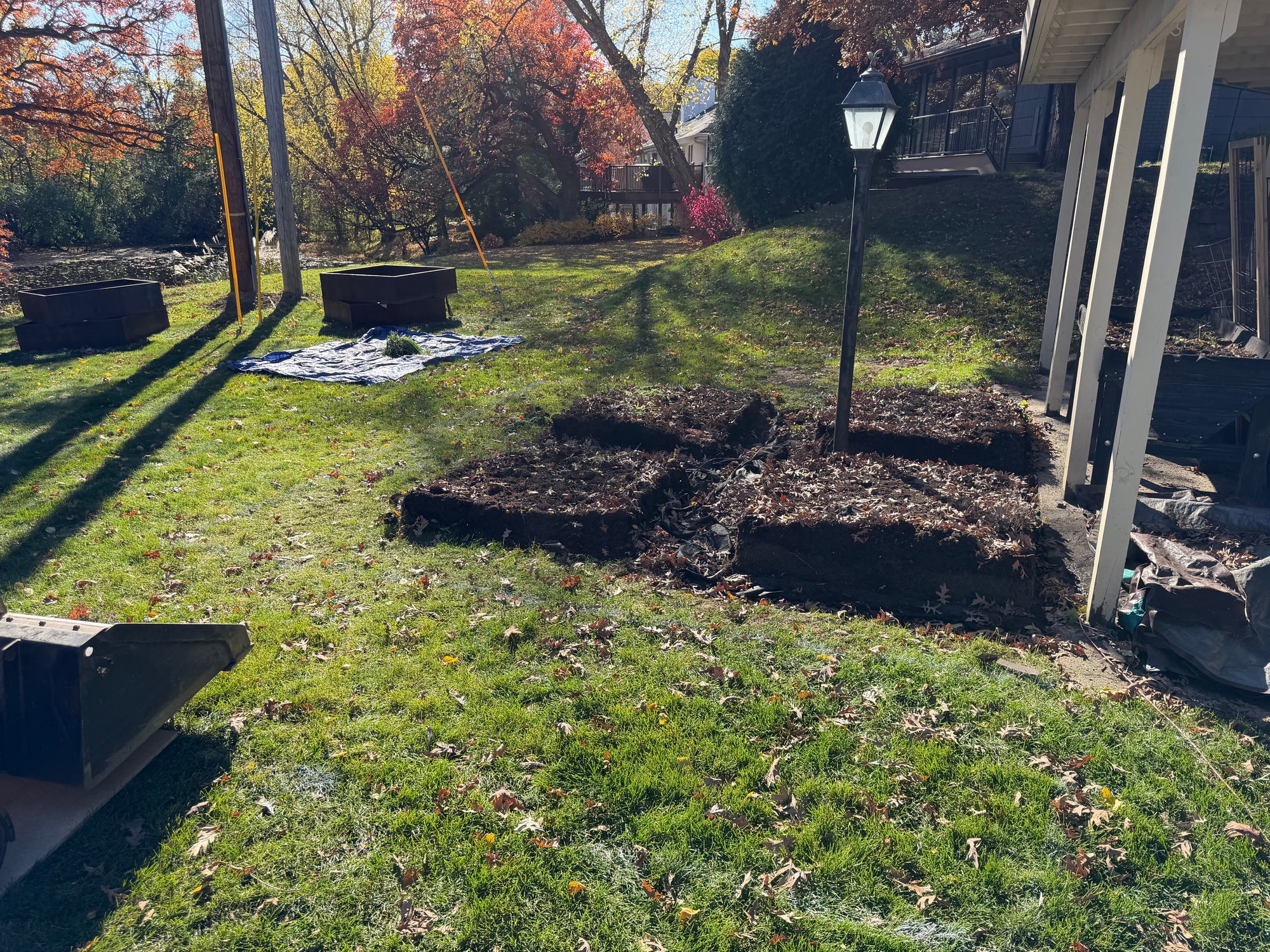 Custom backyard fire pit and patio project by Elzo Landscape LLC in Edina Minnesota