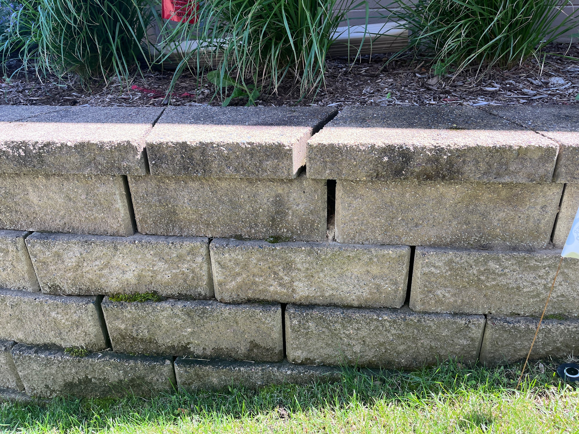 Existing aging retaining wall before demolition in West Bloomington Minneapolis