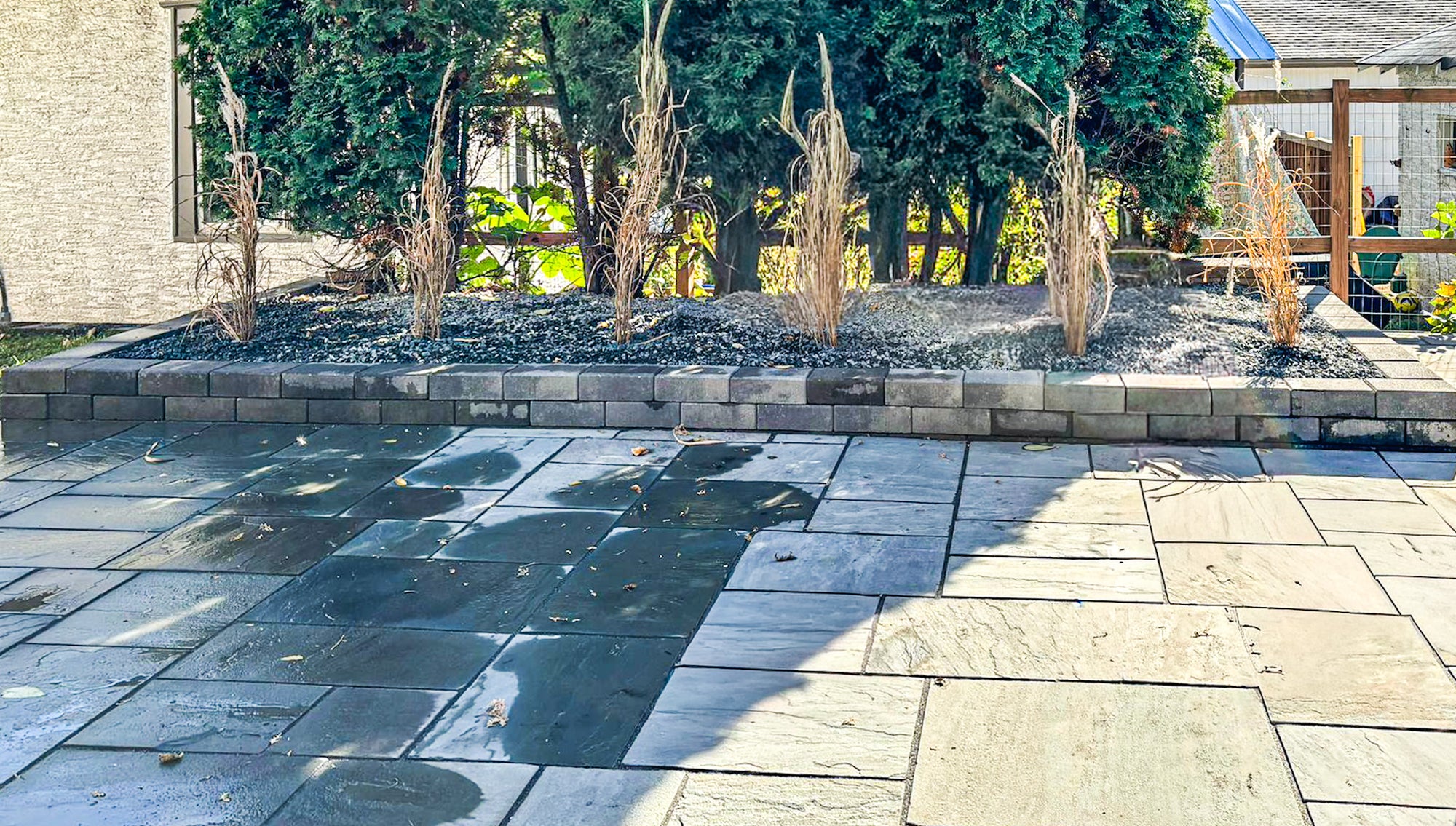 Backyard makeover with patio and ornamental grasses in Minneapolis
