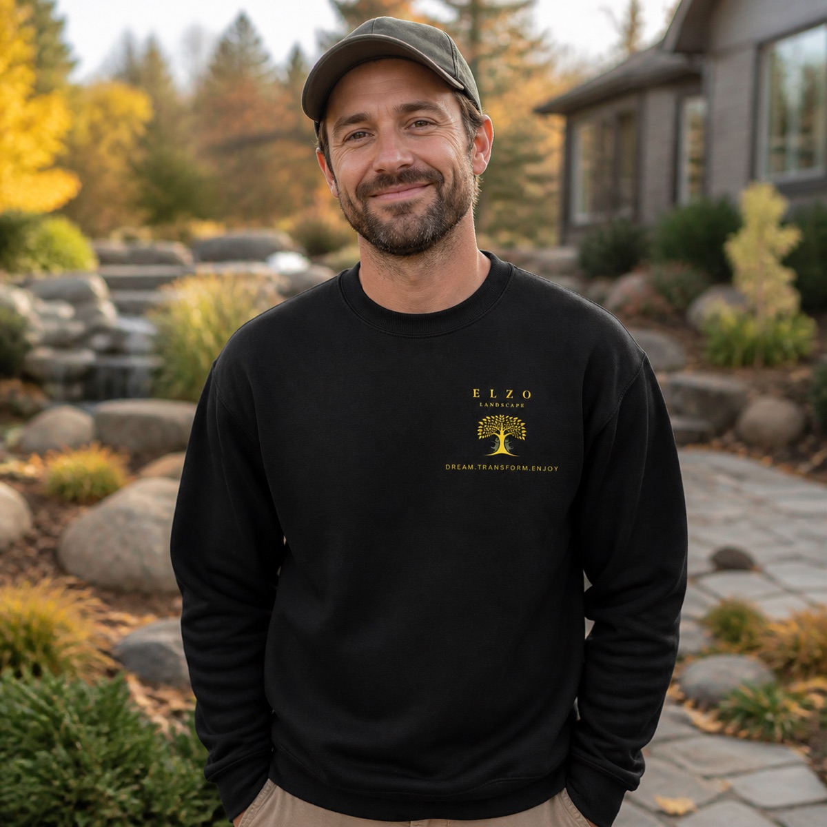 Landscape professional wearing the black ELZO premium crewneck sweatshirt